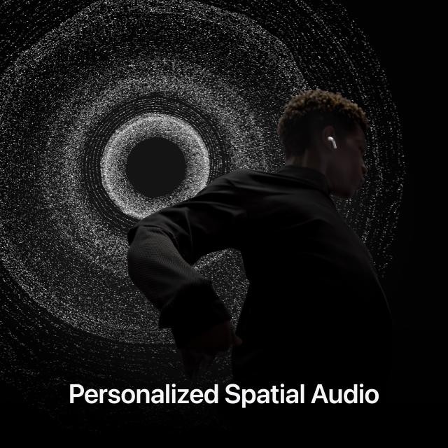 Person dancing wearing AirPods Pro with text: "Personalized Spatial Audio"